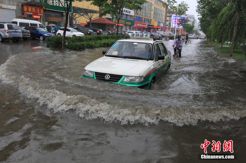 6��18�����磬����ʡ������ͻ�����꣬�®�?sh��)ض��l�ֵ��eˮ���أ�����̎�eˮ���_1�ף�һЩ܇�v����ˮ�Пo�����M��������l(f��) �n�� �z